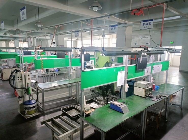 Green workstation assembly benches at the PICO Changshu plant